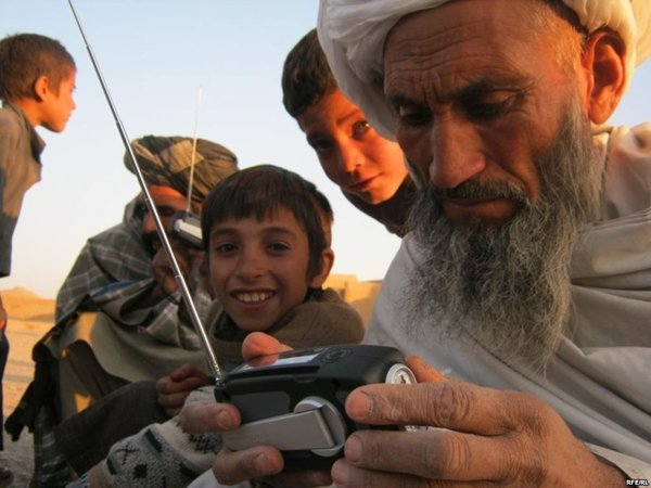 RFERL distributing radios in Shaidave Province Afghanistan, in 2010